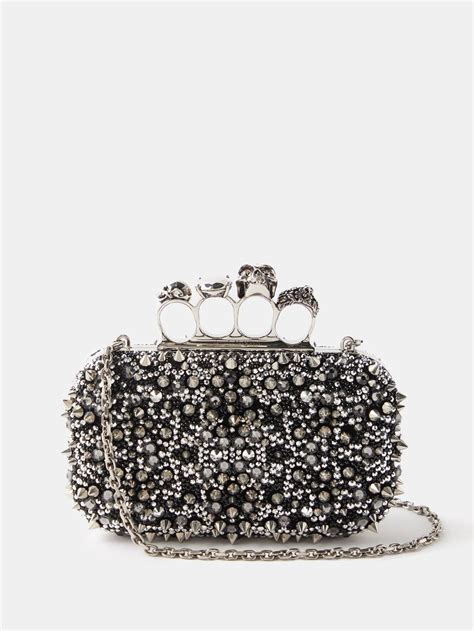 alexander mcqueen silver clutch.